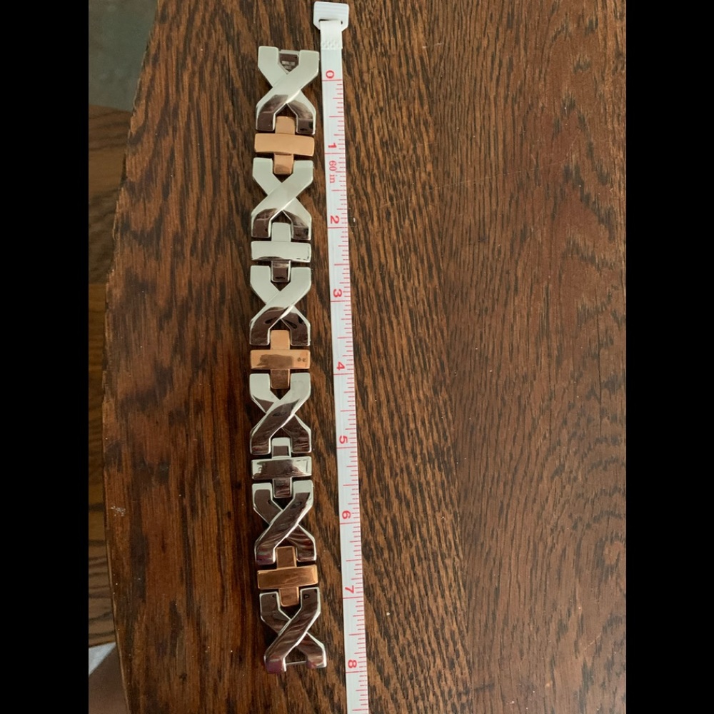 Stainless steel bracelet.  8” long x 3/4” width